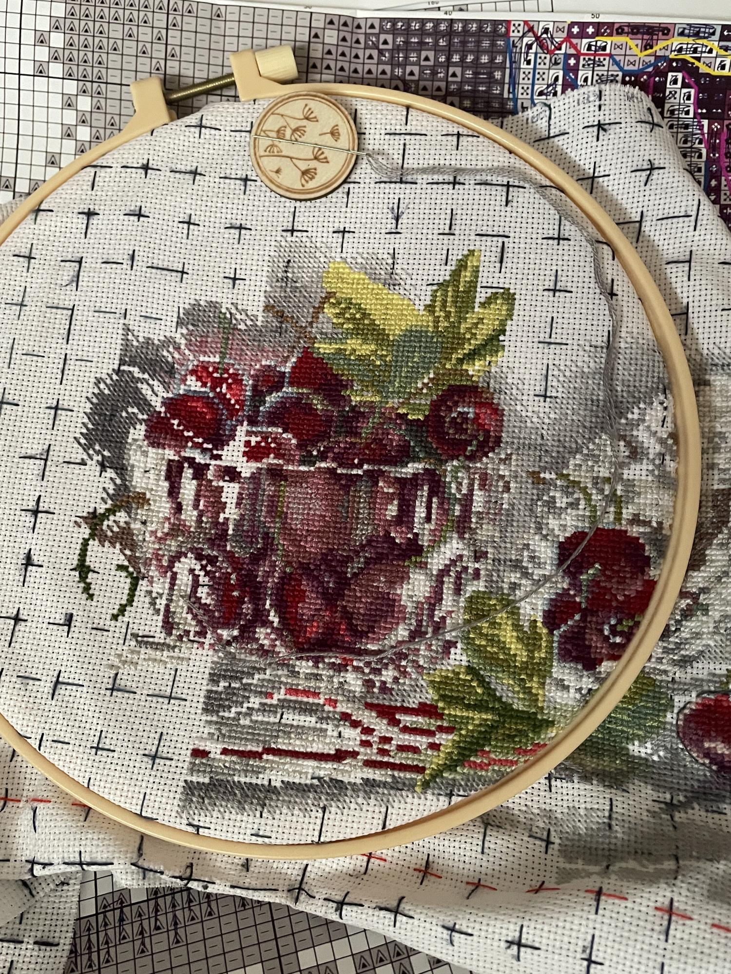 framed textile art with layered embroidery